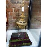 TWO SARONGS AND TWO SCARVES OF IKAT DESIGN TOGETHER WITH A THAI TEMPLE DANCER'S GILT WOOD SPIRE