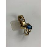 AN 18CT GOLD DIAMOND GYPSY SET RING, DATED 1921,(FINGER SIZE T 1/2) TOGETHER WITH A 9CT GOLD STONE