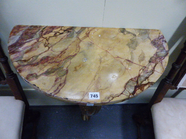 A CARVED PAINTED AND GILTWOOD DEM-ILUNE CONSOLE TABLE IN THE KENTIAN MANNER WITH FAUX MARBLE TOP - Image 2 of 3