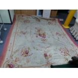 AN ANTIQUE FRENCH AUBUSSON CARPET. 318 X 240CMS.