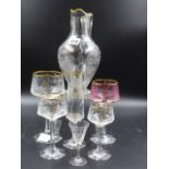 A BOHEMIAN GLASS THIRTY SIX PIECE DRINKING SUITE, EACH PIECE CUT WITH FLOWERS AND MONOGRAMMED FOR