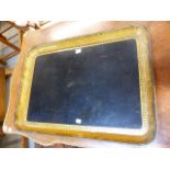 A REGENCY BLACK PAPIER MACHE RECTANGULAR TRAY WITH GILT DIAPER PATTERN BANDED DECORATION. W.71CMS.