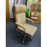 A MID CENTURY BENTWOOD AND CHROME FRAME SWIVEL ARMCHAIR.