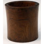 Chinese Huanghuali wood brush pot, round shaped body with hole on base, 6 1/4" x 6 1/4".