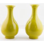 Pair of 20th C. Chinese yellow-glazed Yuhuchun vases, one with Yongzheng mark, one with Heng Feng