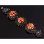 Late 19th C. Chinese silver filigree bracelet with intricately carved coral medallions, 7" x 1 1/