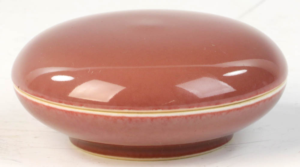 Chinese round red-glazed ink box with Kangxi marked on base, 3 1/8" diameter.