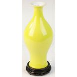 Chinese lemon yellow-glazed, olive-shaped porcelain vase with blue and white underglazed Qing
