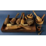 Group of (14) pestles, mortars, with tray. Provenance: Studio Props of Martha Stewart.