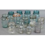 Collection of (43) canning jars, ranging in size from 2 1/2" x 11 1/4", some lids included.