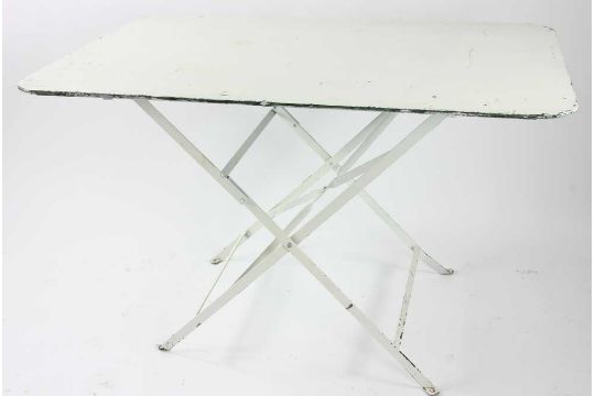 White folding metal table, 29" H x 31" W x 46" L. Provenance: Studio Props of Martha Stewart. - Image 1 of 3