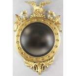 French bullseye mirror with eagle finial, 40" H. Provenance: Charlestown, Massachusetts estate.