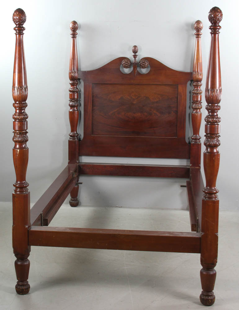 19th century mahogany four-poster bed with pineapple finials, 67 1/2" H x 84" L x 47" W. Provenance: