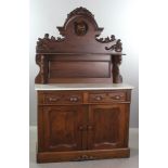 Victorian walnut huntboard with carved foxhead and marble top, shelf above and two drawers over