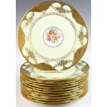 Set of twelve (12) Bavarian service plates, wide gold swag border with handpainted floral center,