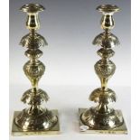 Late 19th century Polish brass candlesticks signed Norblin & Co., 14" H x 5" W x 5" D. Provenance: