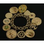 14K yellow gold charm bracelet with 14K yellow gold charms, 7" L, approximately 138 grams TW. PLEASE