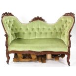 Fancy Victorian carved rosewood sofa, rose design, 36" H x 58" W x 26" D. Provenance: Salem,