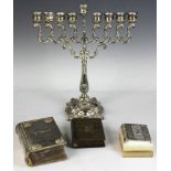 Judaica grouping including menorah and books, some silverplate, four (4) items total. Provenance: