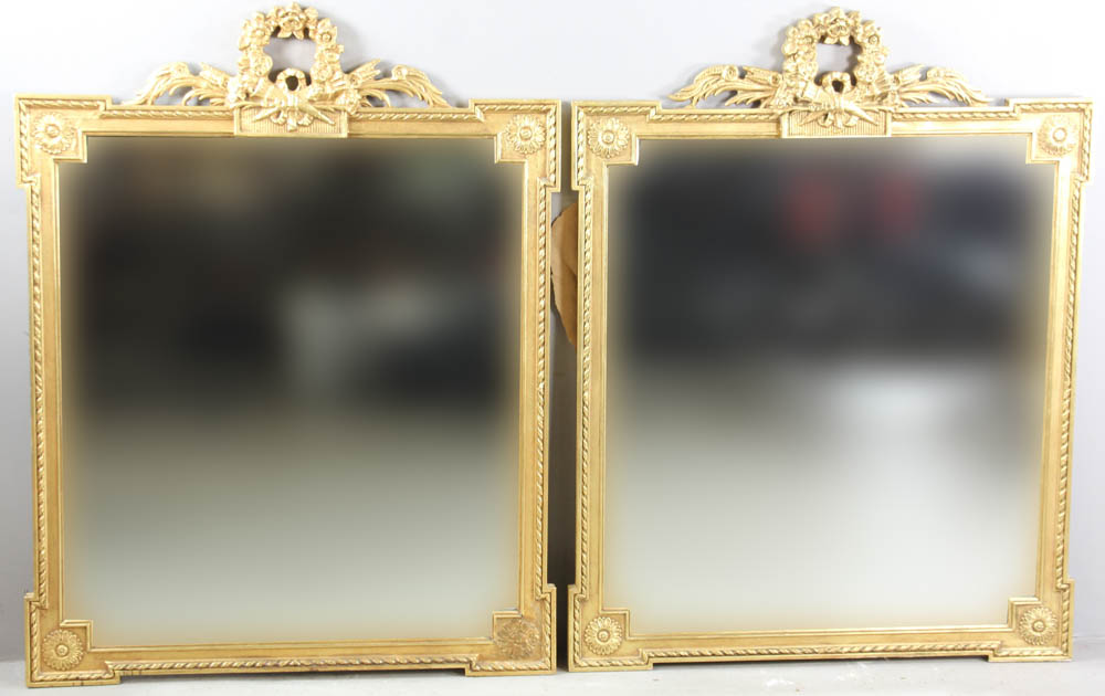 Pair of continental matching mirrors having wreath crests, 46" x 36". Provenance: Beverly,