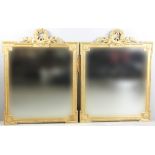 Pair of continental matching mirrors having wreath crests, 46" x 36". Provenance: Beverly,