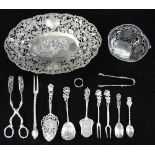 Continental silver items to include: Dutch silver tray; asparagus tongs; sugar tongs; pie server;