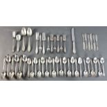 Towle sterling silver flatware, including: (12) teaspoons, (6) butter spreaders, (6) tablespoons, (