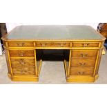 20th century mahogany partner's desk, nine drawers on each side, 30" H x 65" W x 42" D.