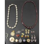 Collection of vintage and sterling costume jewelry, to include bead necklace, bakelite necklace,