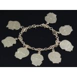 14k gold charm bracelet, 26 grams. Provenance: Billerica, Massachusetts collection. PLEASE NOTE: