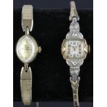 Two 14k gold ladies' watches, Benrus and Jules Jurgensen. 28 grams TW, including movements and
