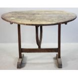 17th century Massachusetts shoe foot, tilt-top table, 28" H x 40" diameter. Provenance: Estate of