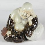 Japanese Meiji period porcelain Buddha, 7" H x 8" W. Provenance: Wells, Maine collection.