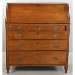 Mahogany four-drawer, slant-lid desk with fitted interior, 43" H x 38 1/2" W x 20" D. Provenance: