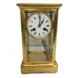 Late Victorian Gilded Brass 4 Glass Mantel Clock with 2 train movement, enamelled dial, gong