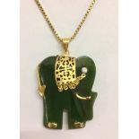 9ct Gold Box Chain set carved jade elephant with white stone eye & yellow metal fittings