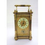 Late C19th 8 Day Brass Carriage Clock with enameled chapter ring with Arabic Numerals, tracery