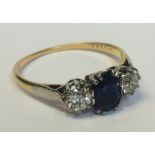 Ladies 18ct Yellow Gold Diamond & Sapphire 3 Stone Ring, 2 diamonds, each approx. .2 carat,