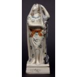 Prattware figure of Hope, circa 1790, with title to front of square base, modelled as a lady with