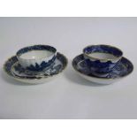 Two late 18th century English tea bowls and saucers, printed in blue with gilded detail (2)