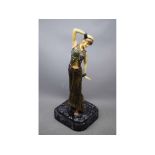 Late 20th century polychrome resin figurine of an Egyptian dancer, unmarked, 39cms tall