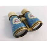 Pair of French enamelled and ivory opera glasses with decorative floral and turquoise gilt