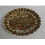 Early 20th century Satsuma charger with scalloped border, decorative figure painted centre, seven-