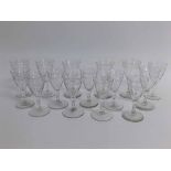 Part suite of 19th century glass wares to include seven conical wine glasses with clear stems and