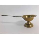 18th century circular brass skillet with an iron handle and copper rivets, 28cms long (to include