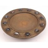 Unusual brass tazza of circular pedestal form, the spreading rim moulded with rope twists and