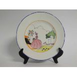 Clarice Cliff style circular plate, decorated with the Idyll (Crinoline lady) design, gilded Newport