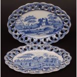 Pair of Spode Pearl ware oval stands with pierced rims, painted with pastoral scenes in blue,