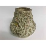 Japanese earthenware vase with moulded relief of a waterfall and cottage scene in a rustic manner,