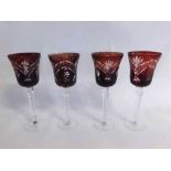 Two boxed sets of Bohemia wine glasses with clear stems and red flash cut bowls (one missing) (11)